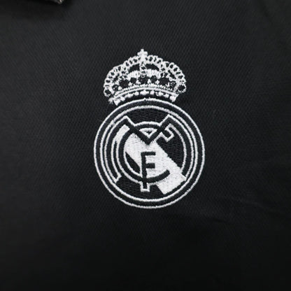 Polo 23/24 Real Madrid nera 